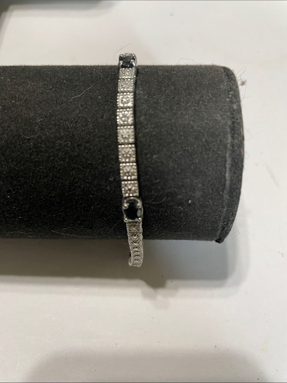 Silver Tone Crystal Tennis Bracelet with Black Accent Stones.  8/11/6